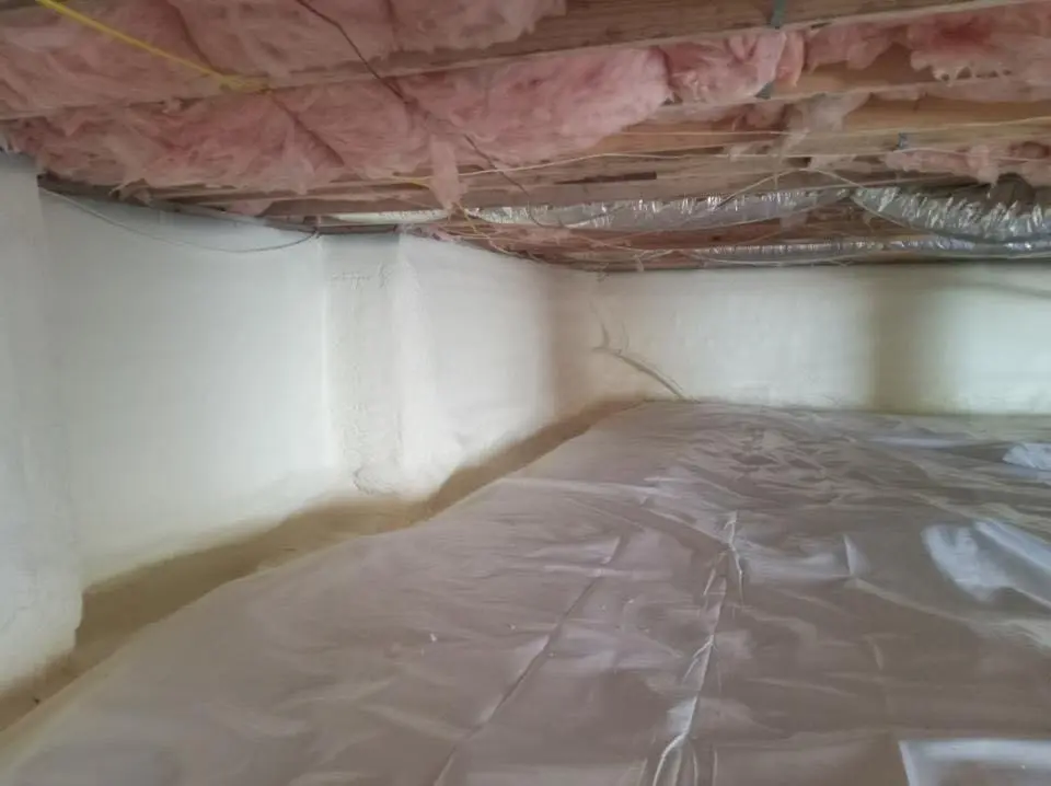 Crawl space encapsulation with closed-cell spray foam for Commercial Roof Restoration in Bryan